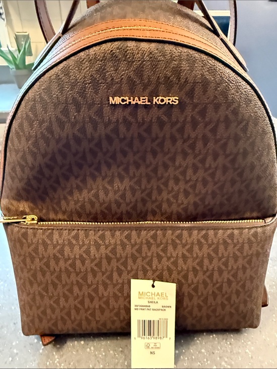 Michael Kors Handbags - Michael Kors Brown Monogram Canvas Backpack with Gold Hardware